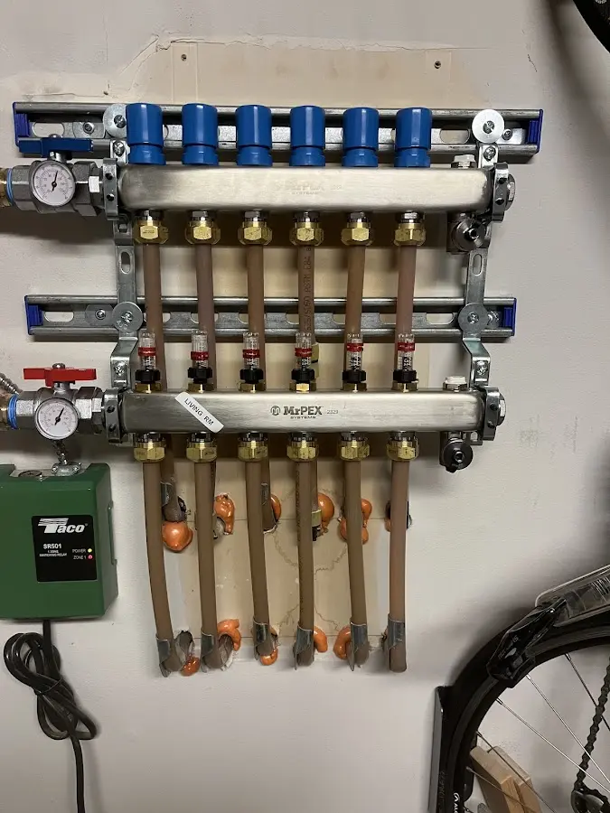 Plumber performing Water Heater Repair at a residential property in West Boylston